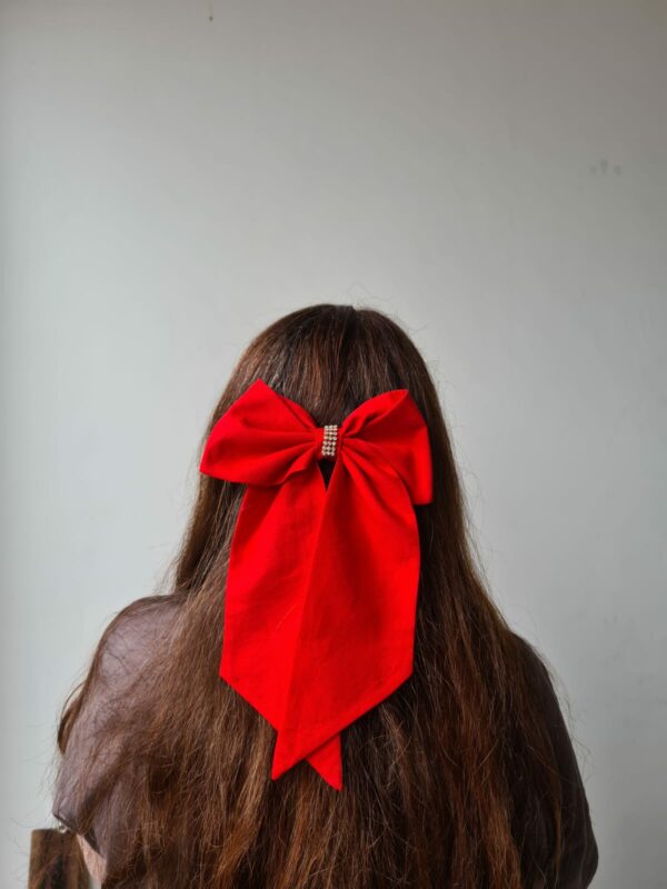 laço de cabelo vermelho
